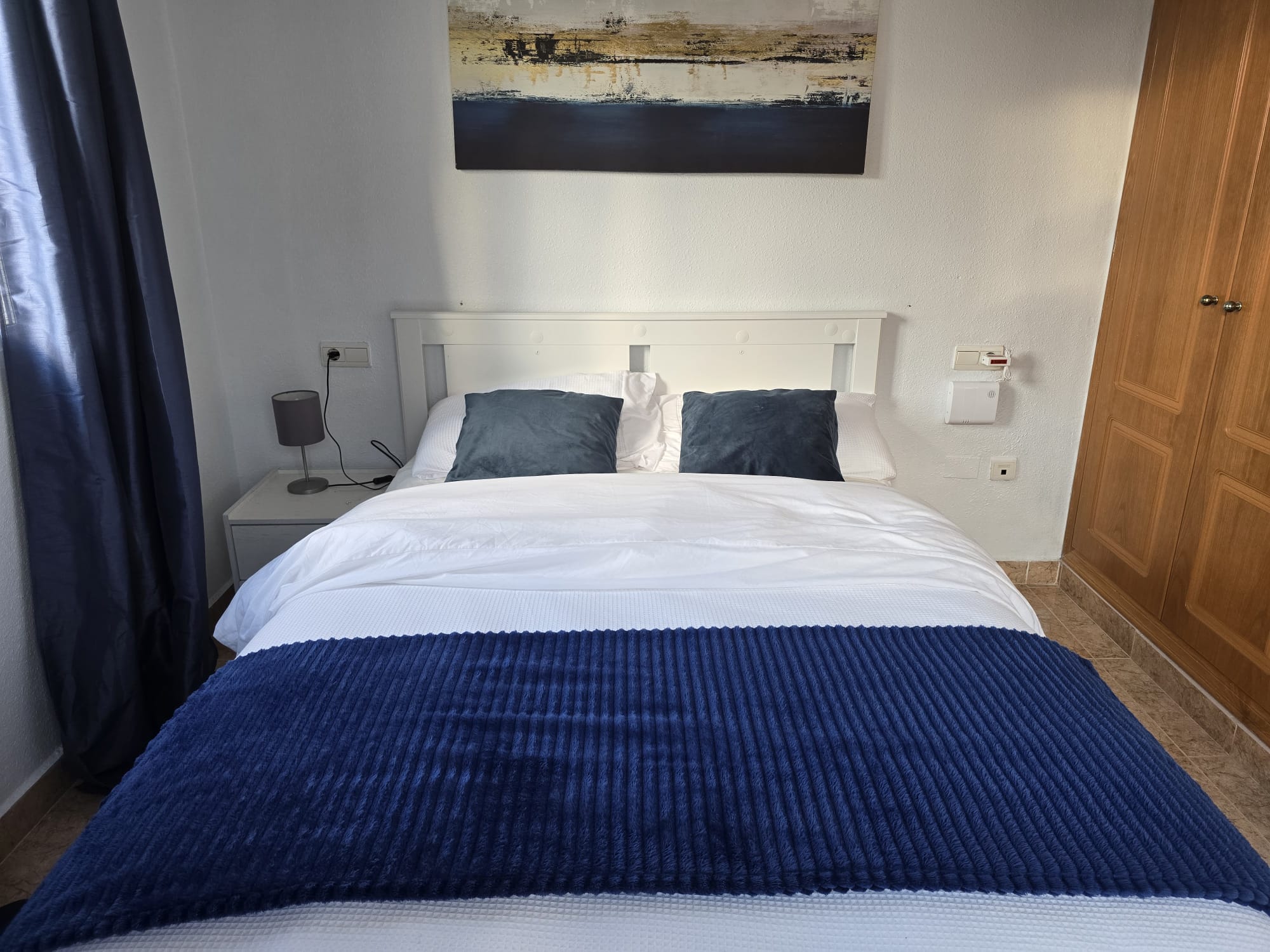 Master bedroom with comfortable double bed