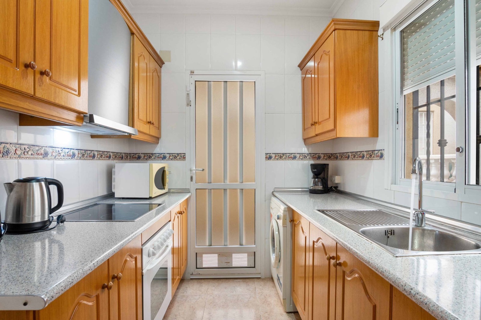 Fully equipped kitchen with modern amenities
